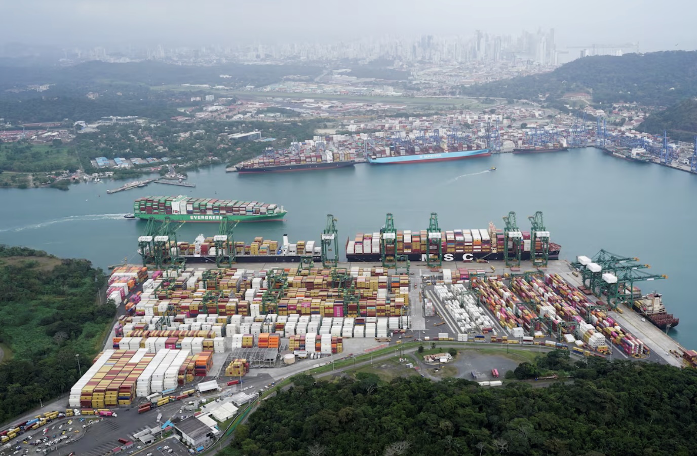 Aerial view of the Panama Canal showcasing existing port facilities.