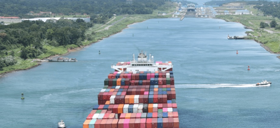 Container ships passing through the Panama Canal, symbolizing increased Panama Canal Revenue from New Port Terminals.