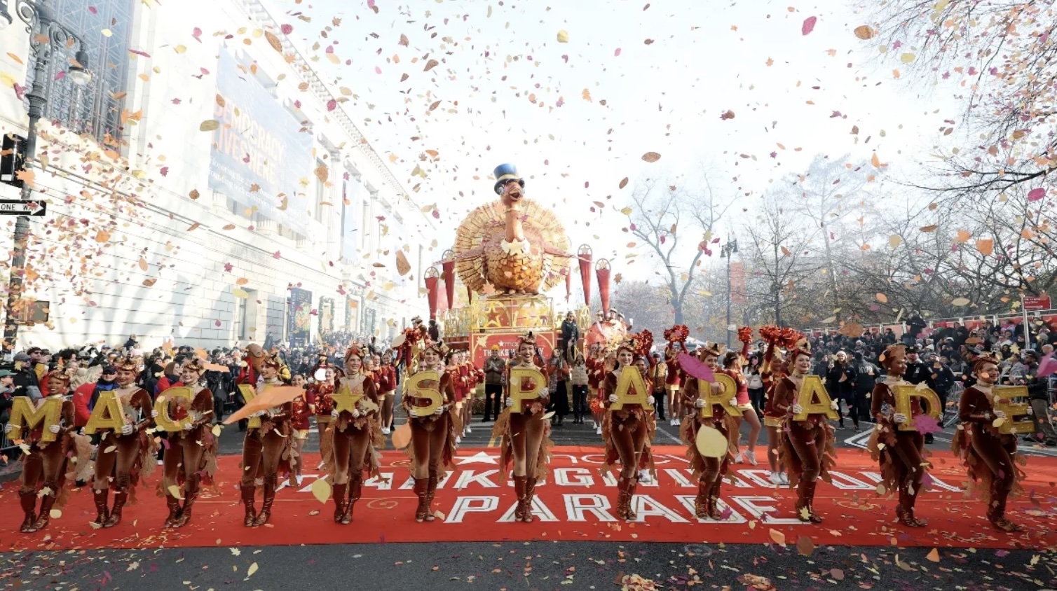 Members of the Panama Marching Band, La Primavera, marching in the Macy's Thanksgiving Day Parade, showcasing Cultural Representation and traditional costumes.