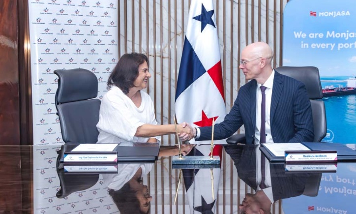 Official signing of the Panama Canal Monjasa partnership for waterway sustainability and community engagement.