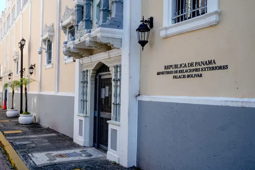 Officials discussing international cooperation Panama projects for education and tourism development.