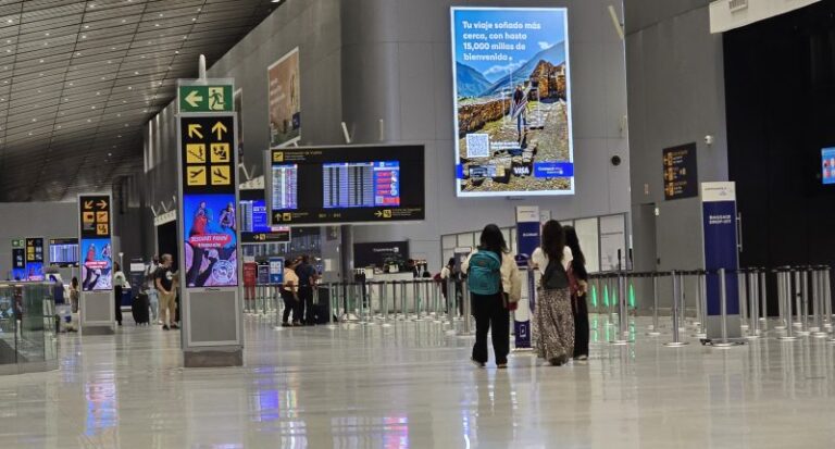 Multiple airplanes parked at the gates during a major surge in Panama aviation growth.