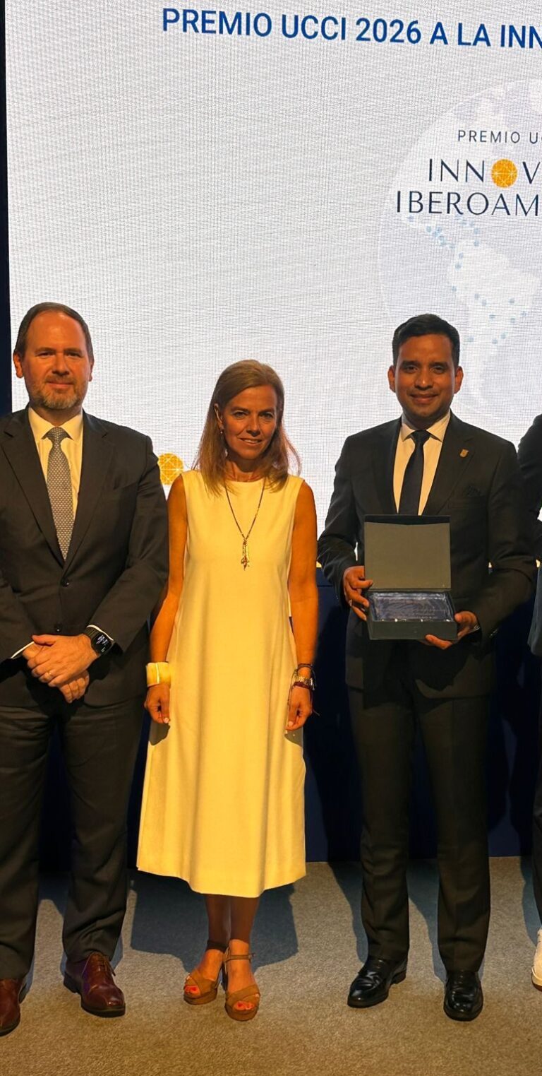 Municipal authorities proudly holding the official Panama City UCCI award plaque during the international summit.