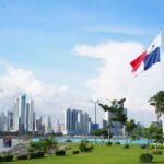 International financial advisors presenting the benefits of the official Panama investment migration programs during a conference in Paris.